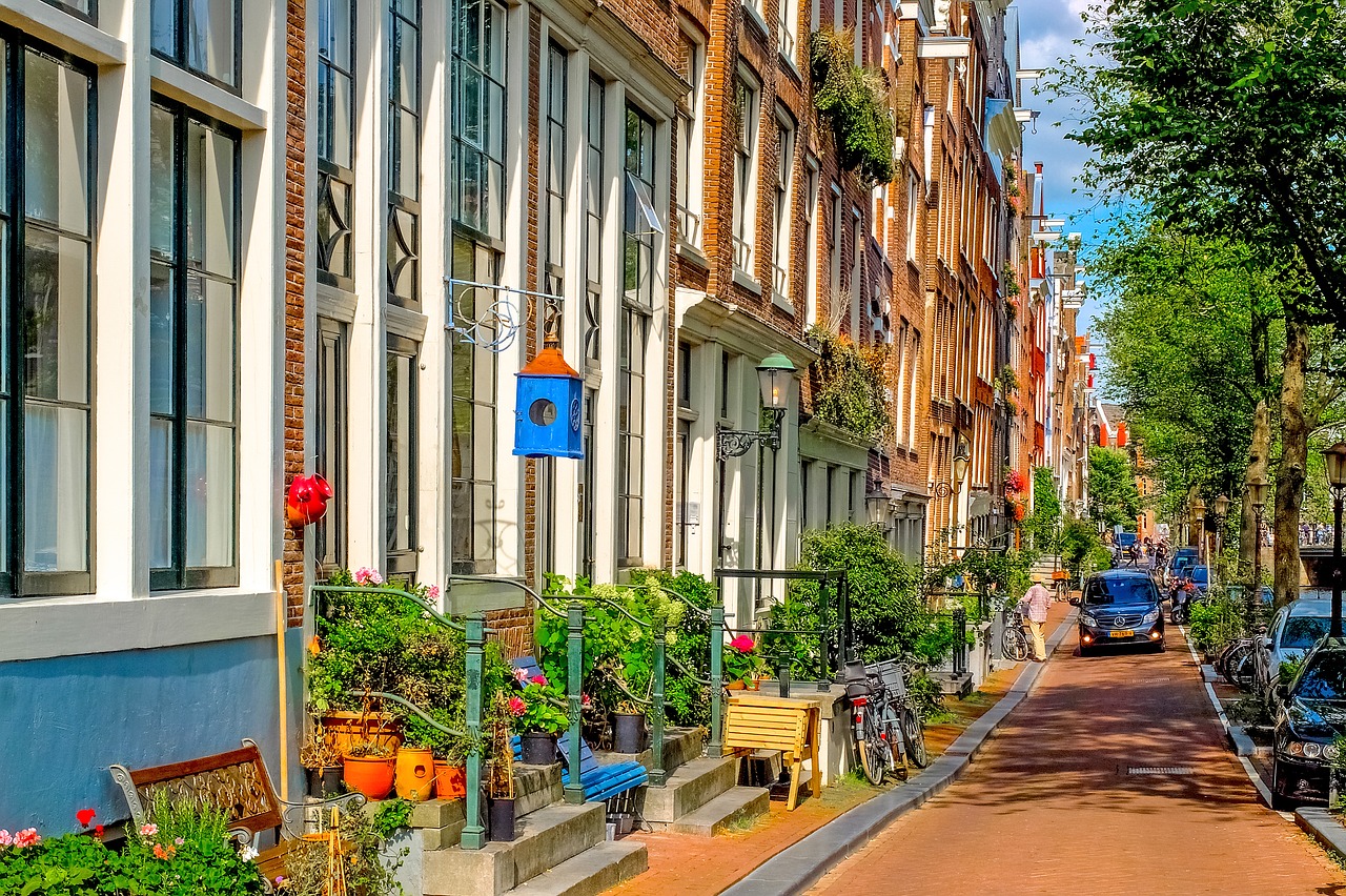 Charming Jordaan neighborhood street with boutiques and bikes in Amsterdam